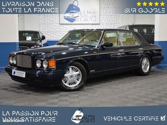 bentley brooklands v8 6.7 r 305-08/1997-90.978km-3ème main-black emerald mica-cuir intégral beige-intérieur bois-cuir étendu-sièges electriques à mémoire-sièges