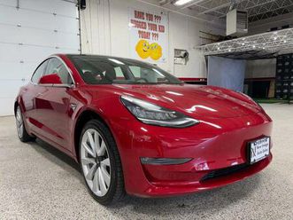 used 2018 tesla model 3 mid range
