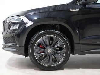 skoda karoq - 1.5 tsi act sportline business panoramadak trekhaak privacy glass