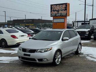 used 2011 kia forte5 sx, leather, low kms, certified
